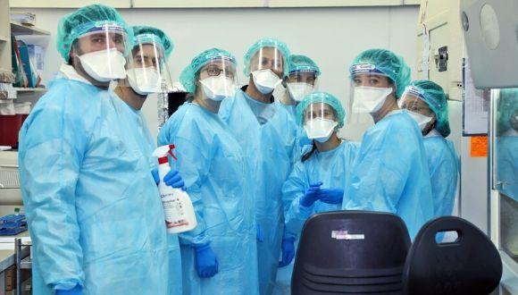 volunteers at Sheba Medical Center wearing protective gear